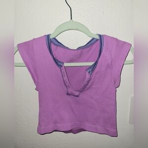 Out from under baby tee